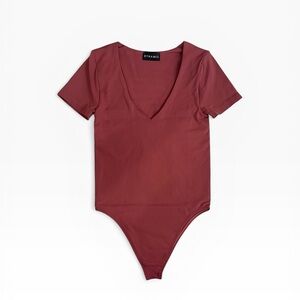 Dynamic Maroon Short Sleeve V-Neck Double lined Bodysuit | Stretch Size OS NWOT
